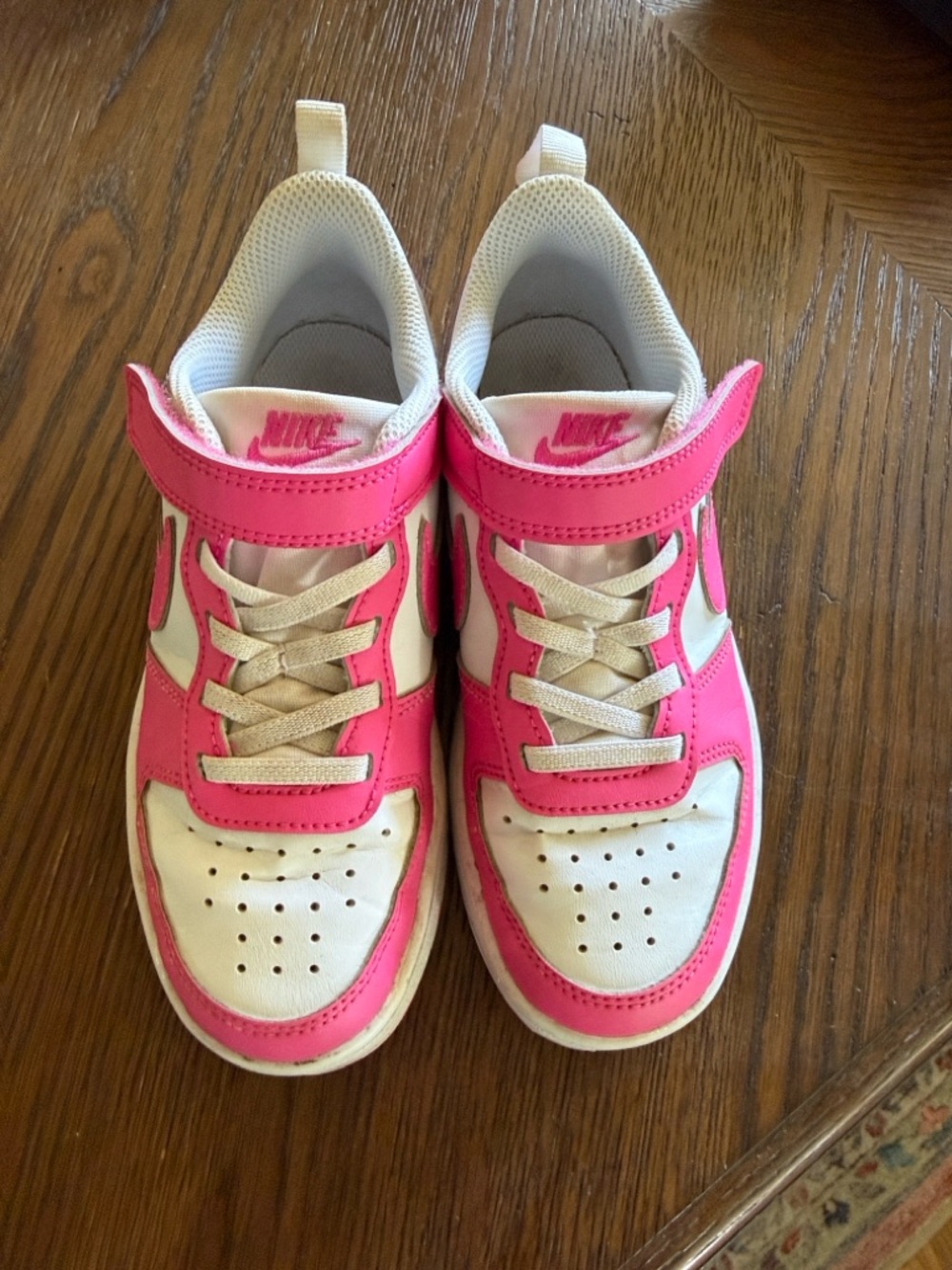 Size 13.5 Nike Kids' Pink low top sneakers GUC
